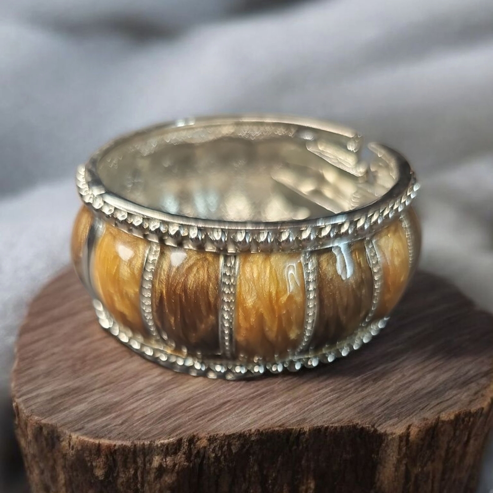 Silver and Brown Bohemian Bracelet with Intricate Detailing